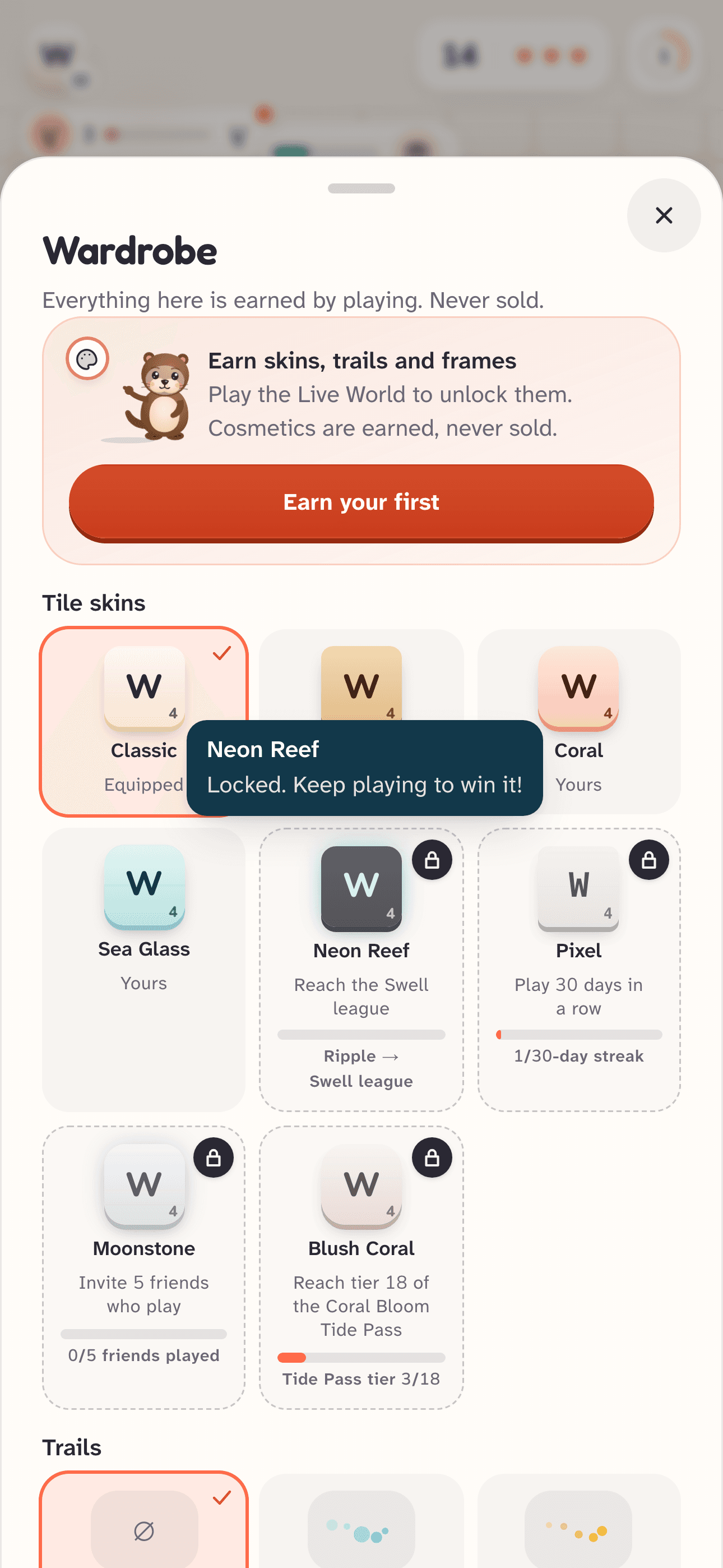 The Wardrobe on a phone: tile skins such as Classic, Driftwood, Coral and Sea Glass, and trails like Bubbles and Sparks, each unlocked by playing.